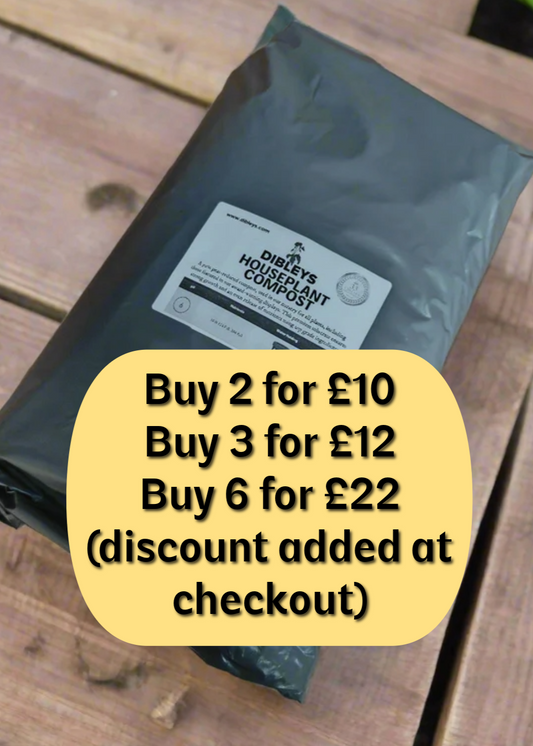 Bag of compost on a wooden surface with promotional text overlay.